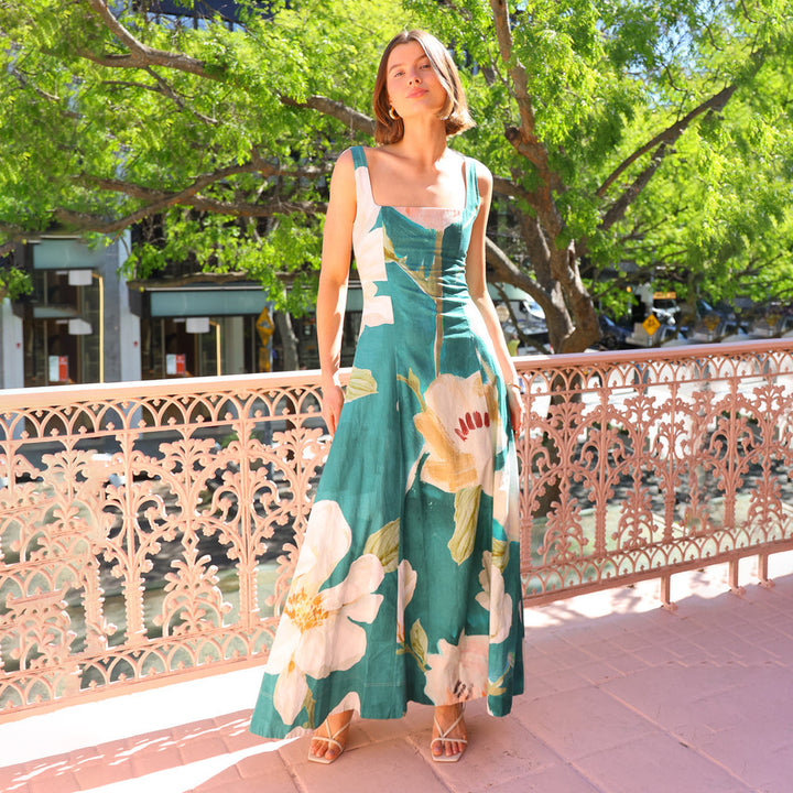 Women's maxi dress with floral design and fitted silhouette