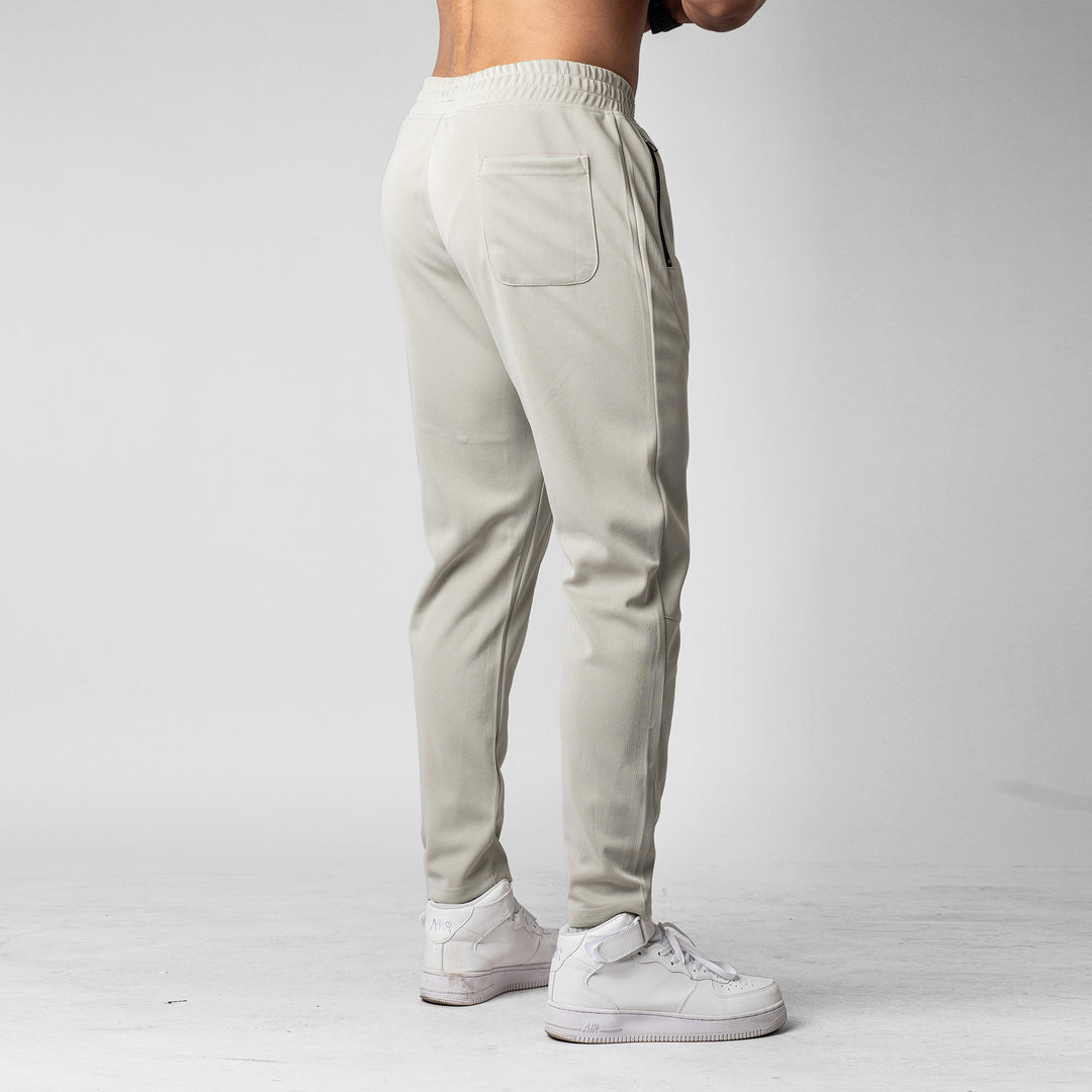 Men's sporty jogging pants with innovative breathable structure and practical zip pockets Lisslune