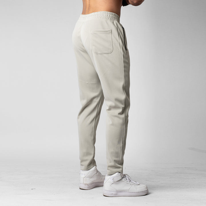 Men's sporty jogging pants with innovative breathable structure and practical zip pockets Lisslune