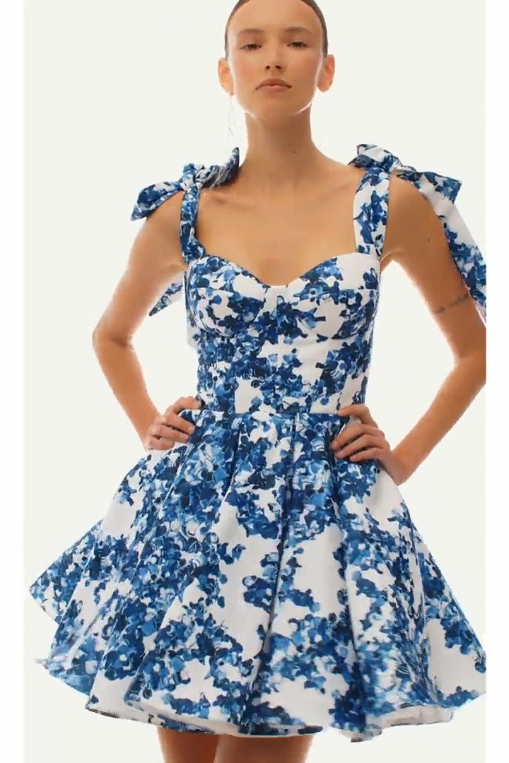 Women's Playful Mini Dress with Floral Design and Sophisticated Straps