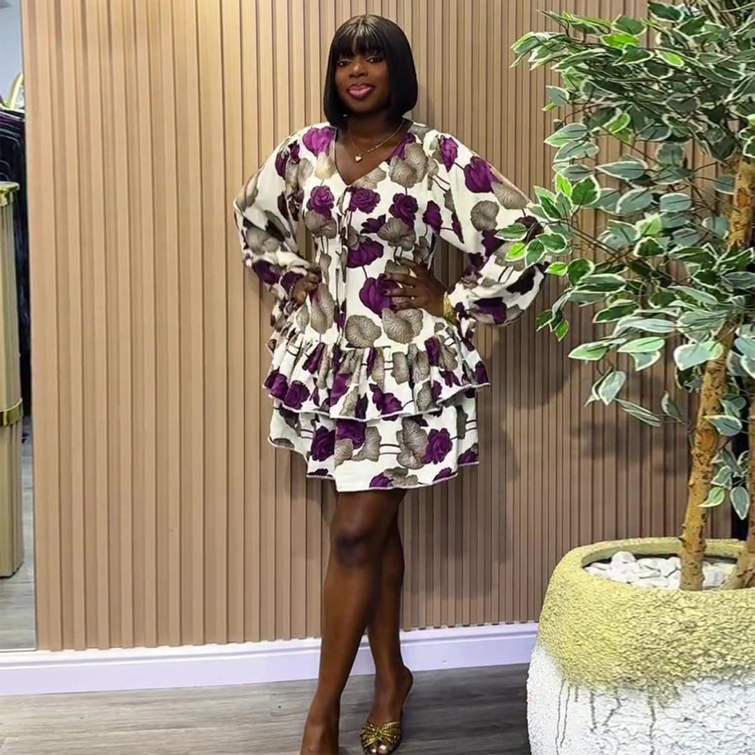Women's floral pattern mini dress with voluminous sleeves and ruffle details