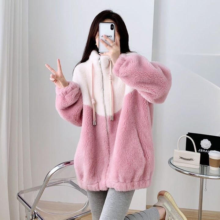 Women’s plush jacket with high closing collar and practical zippered pockets Lisslune