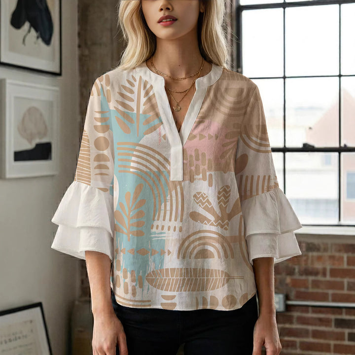 Women's blouse with ruffle details and eye-catching animal print Lisslune