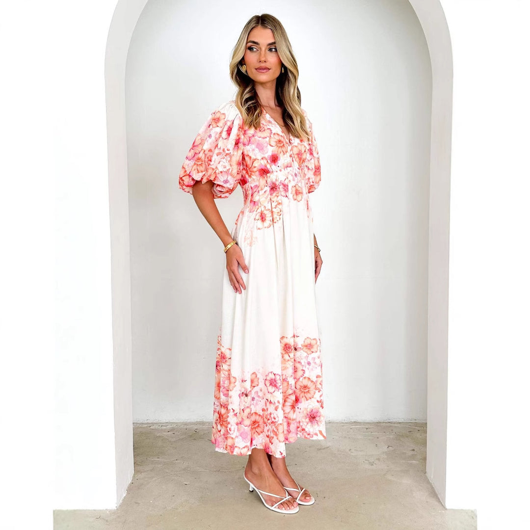 Women's maxi dress with voluminous puff sleeves and flowing cut