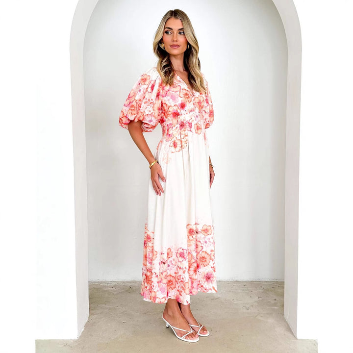 Women's maxi dress with voluminous puff sleeves and flowing cut