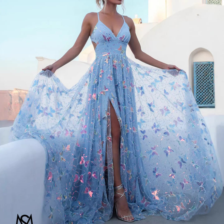 Ladies maxi dress with delicate glitter accents and floral cut