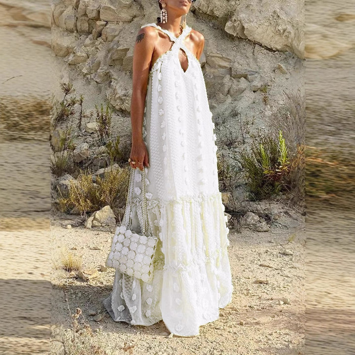Women's maxi dress with playful ruffle details and floral pattern