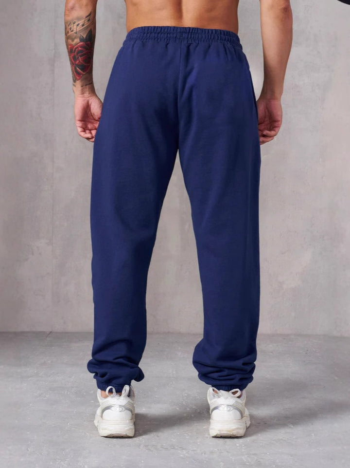 Men's Baggy Jogging Pants with Elastic Waistband and Side Pockets Lisslune