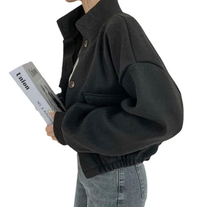 Women's cropped bomber jacket with voluminous sleeves and practical pockets
