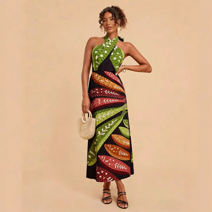 Ladies Halterneck Maxi Dress with Colorful Leaf Design and Flared Cut