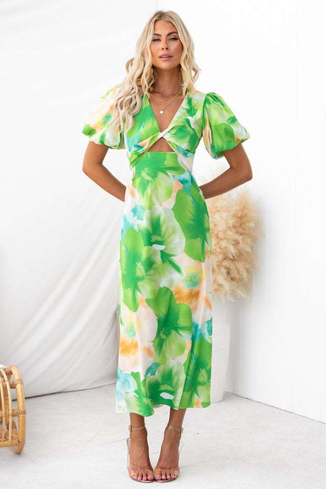 Women's maxi dress with floral accents and an eye-catching cut-out