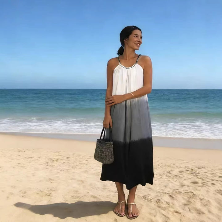 Women's maxi dress with pleated top and embellished straps