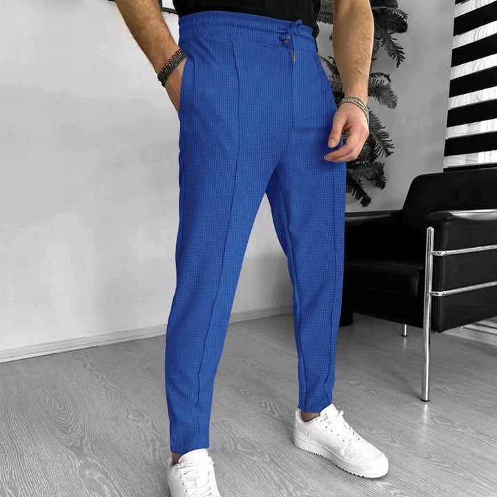 Men's stylish high-waisted pants with elastic drawstring and textured design Lisslune