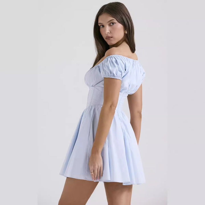 Women’s mini dress with elegant ruffle design and figure-hugging top