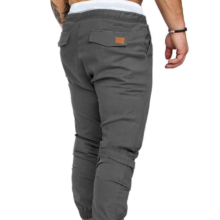Men's casual jogging pants with elastic waistband and practical zip pockets Lisslune