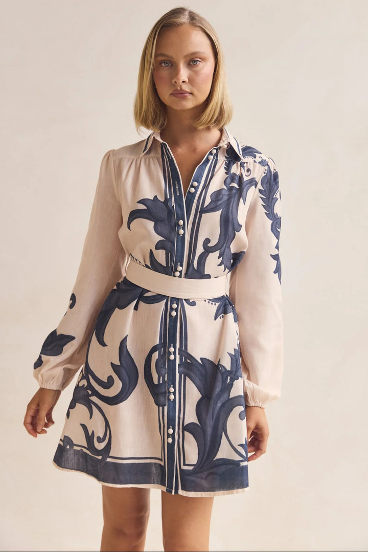 Ladies shirt dress with smooth puff sleeves and floral design