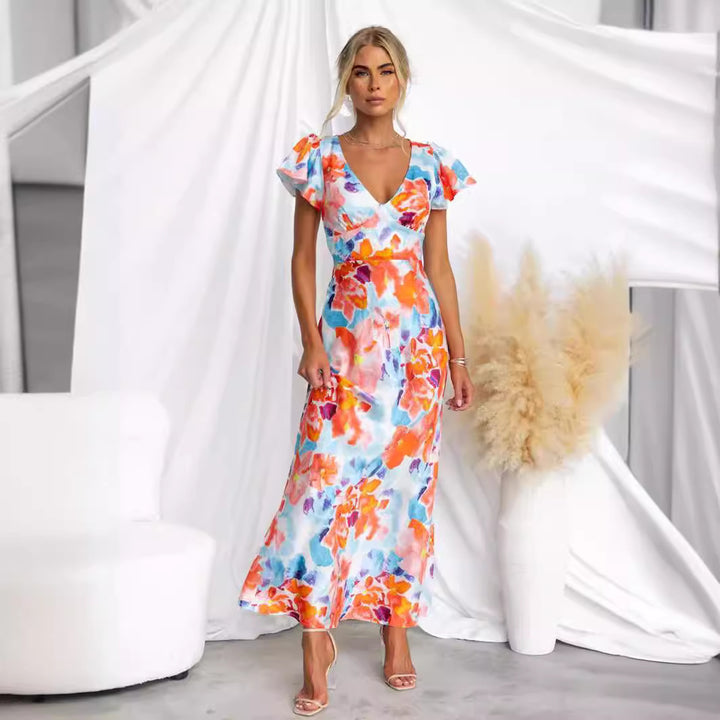 Women's maxi dress with floral design and flowing silhouette Lune London