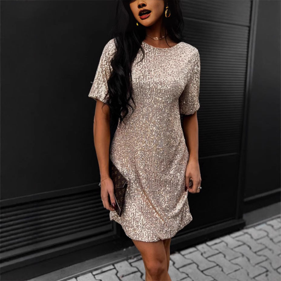 Women's festive cocktail dress made of sparkling material with a light A-line cut
