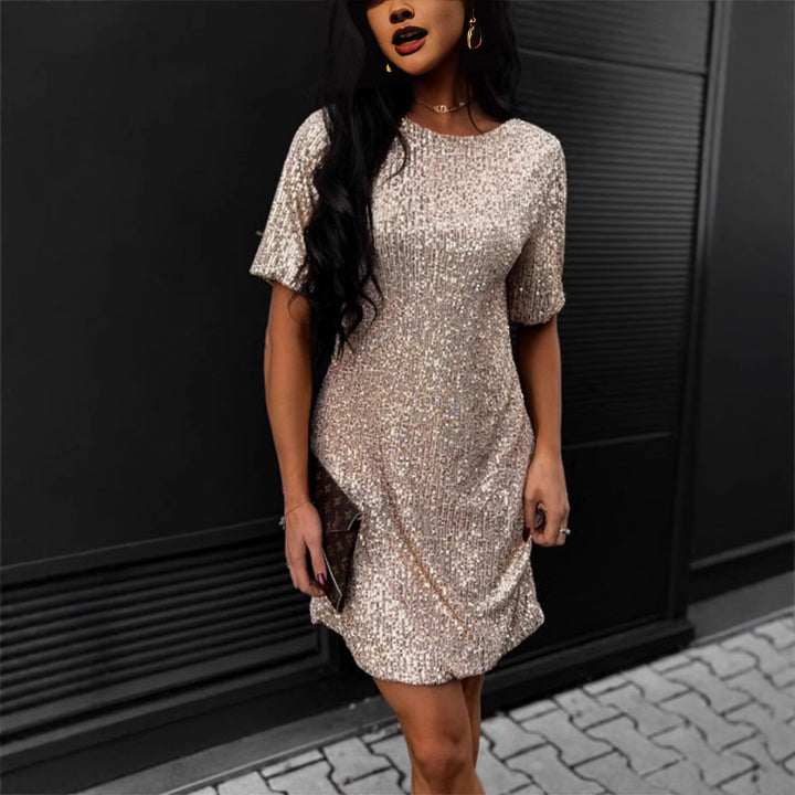 Women's festive cocktail dress made of sparkling material with a light A-line cut