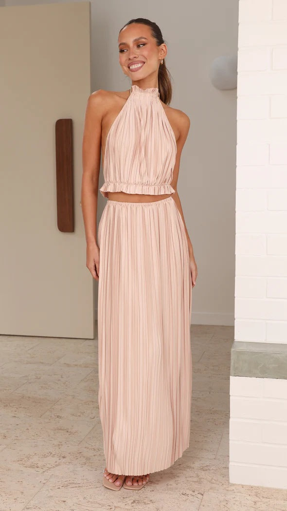 Women's maxi dress with expressive pleated skirt and stylish halter neck Lune London