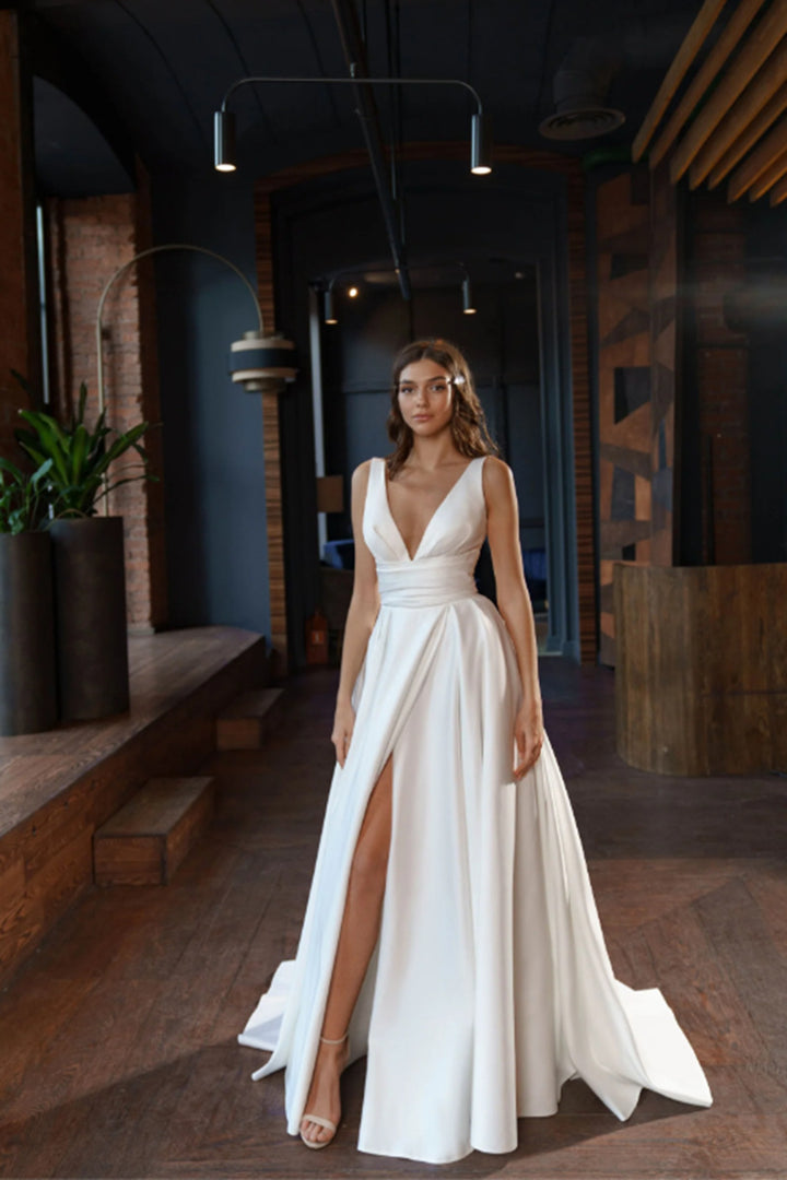 Women's elegant wedding dress with deep V-neckline and side slit