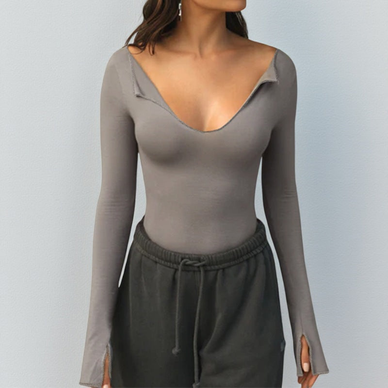 Women's long sleeve bodysuit with deep V-neckline and sophisticated sleeve openings Lune London