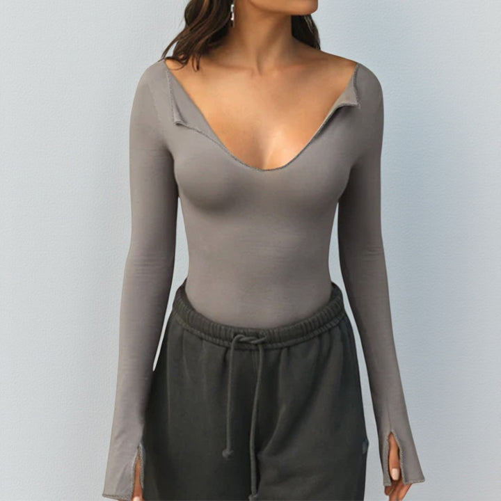 Women's long sleeve bodysuit with deep V-neckline and sophisticated sleeve openings Lune London