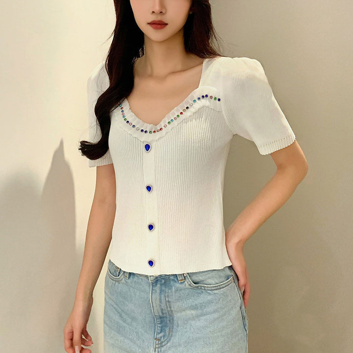 Women's fitted top with decorative button placket and fashionable V-neck