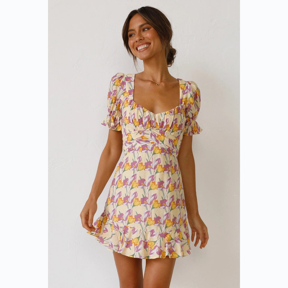 Women's mini dress with voluminous sleeves and playful ruffled hem