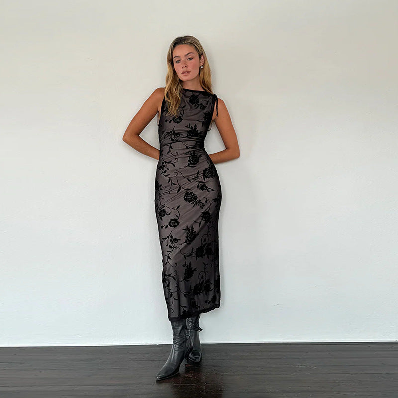 Women’s maxi dress with floral lace detailing and figure-hugging silhouette