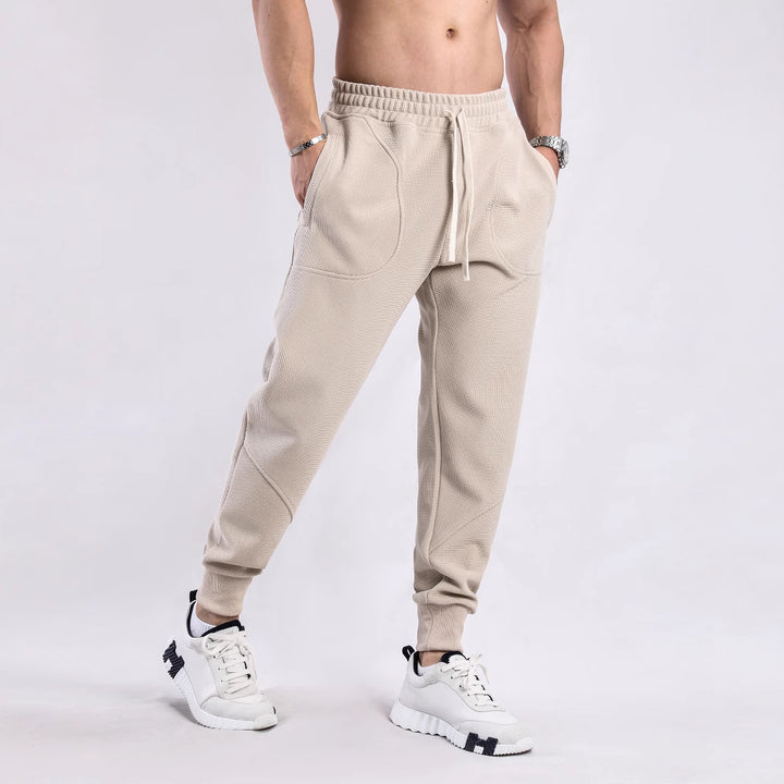 Men's sporty jogging pants with breathable inserts and elastic waistband Lisslune