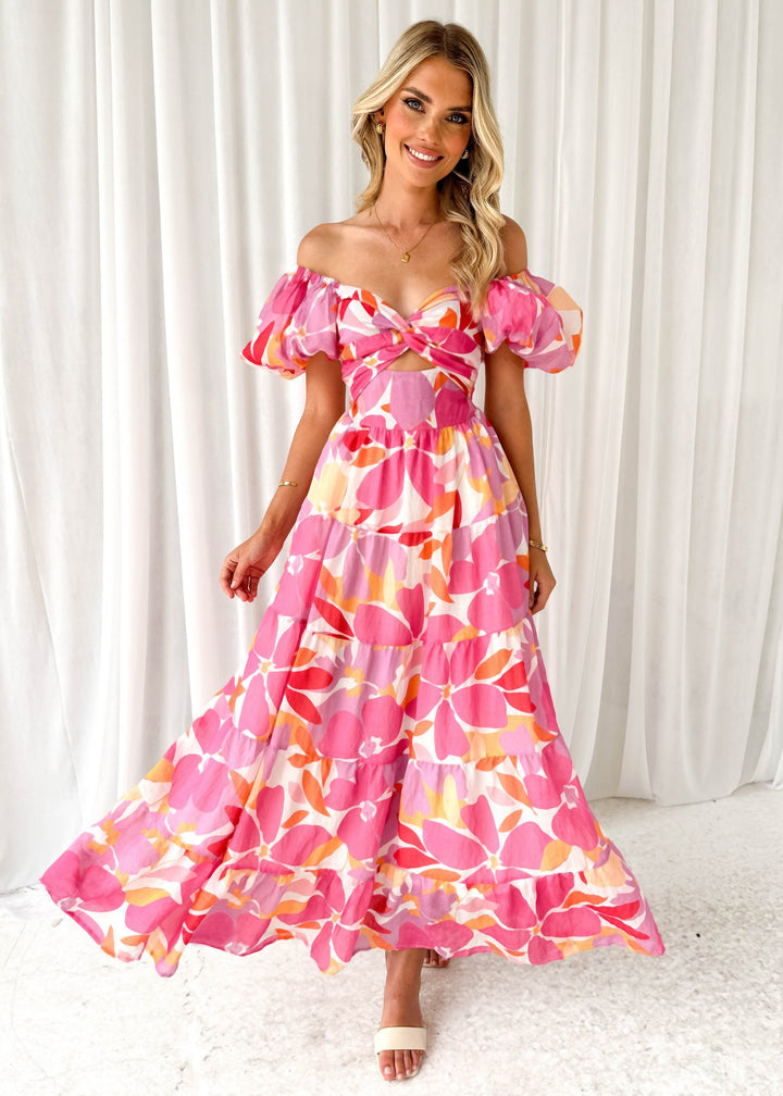 Women's maxi dress with voluminous puff sleeves and floral pattern