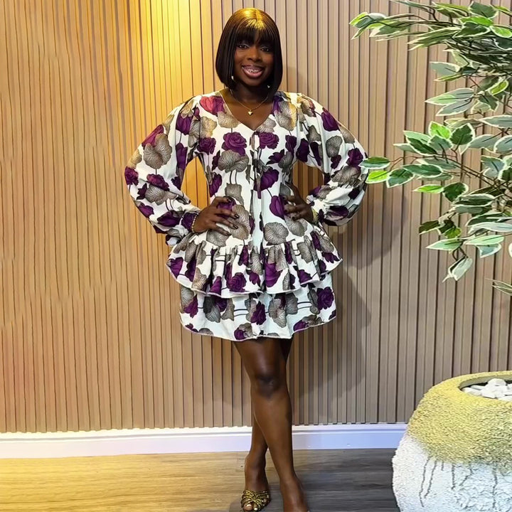 Women's floral pattern mini dress with voluminous sleeves and ruffle details