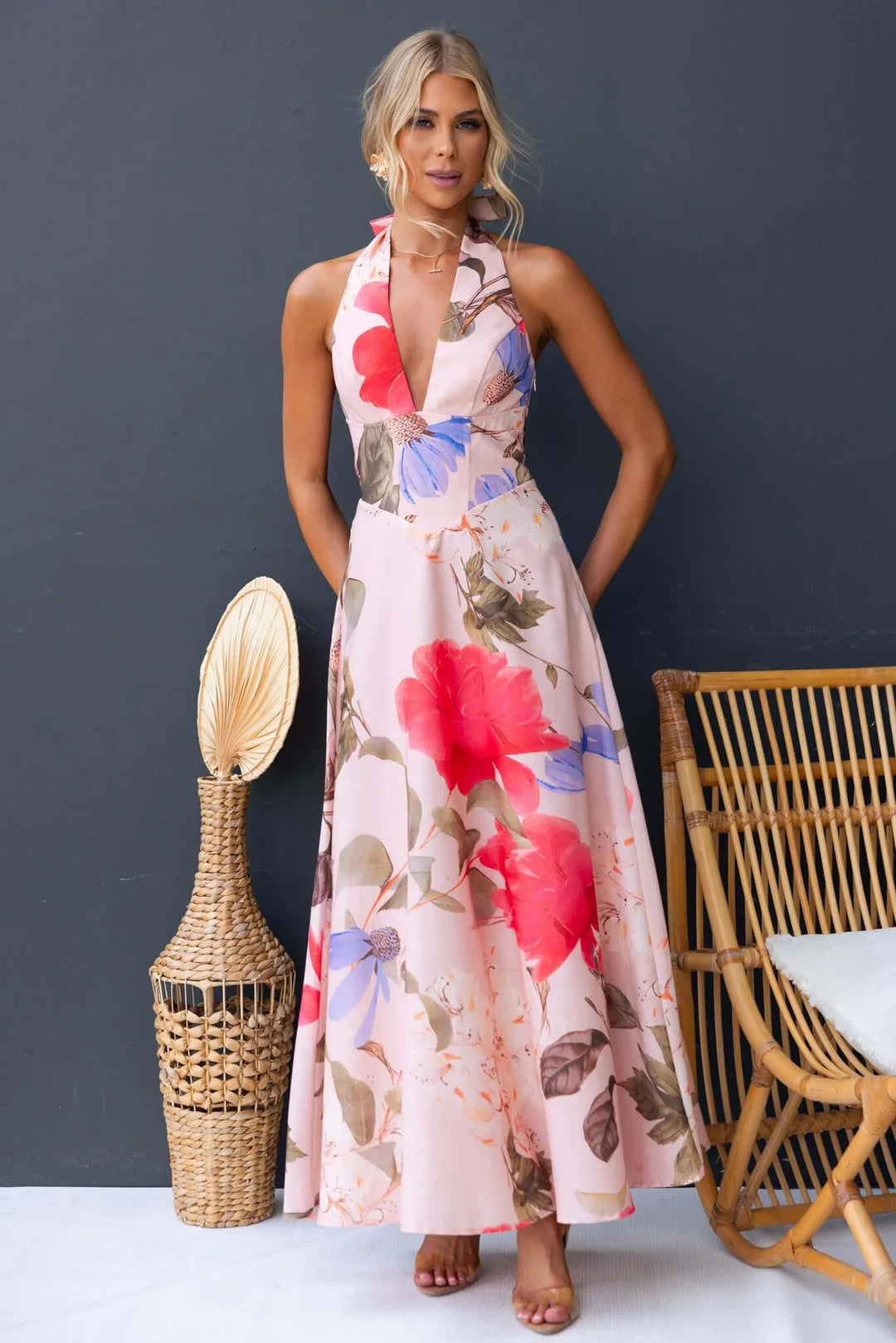 Ladies max dress with deep V-neckline and floral accents Lune London