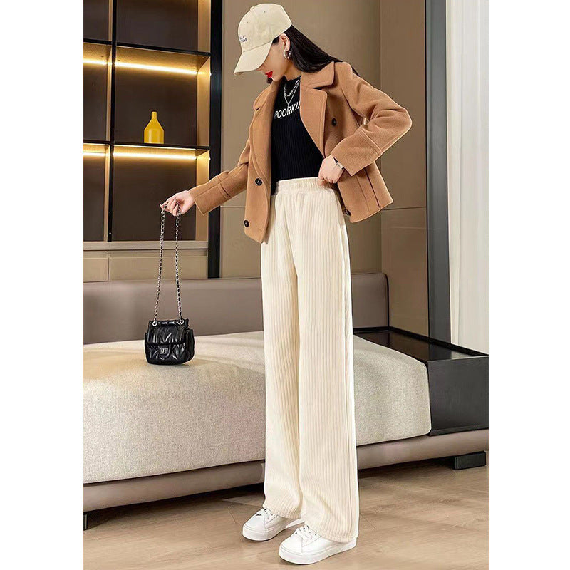 Women's high-waisted corduroy pants with wide leg and elastic waistband