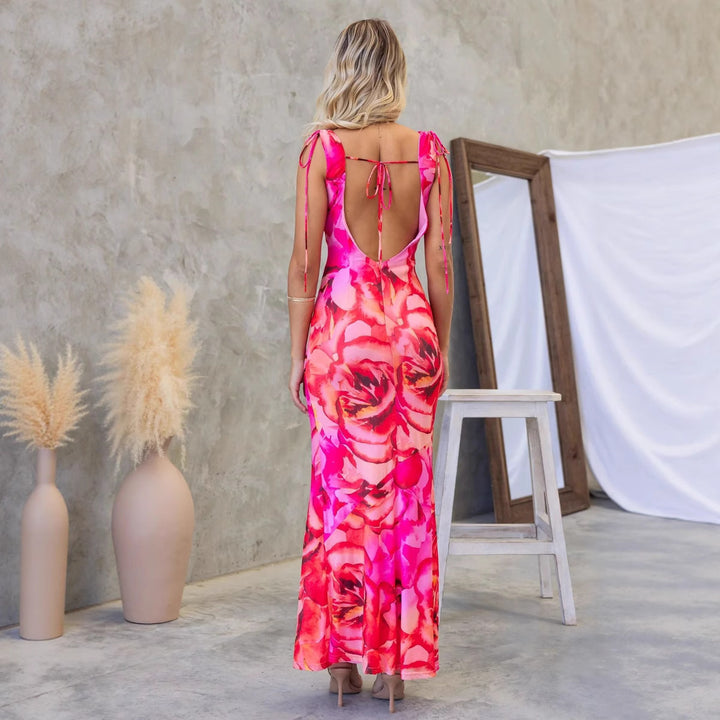 Women's maxi dress with elegant water neckline and floral accents