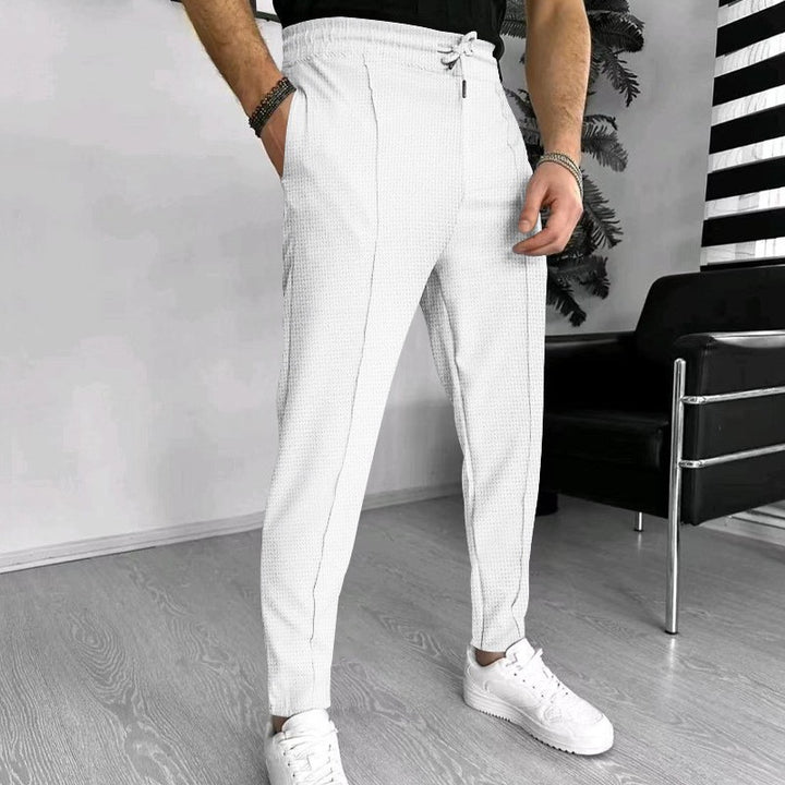 Men's fashionable leisure trousers with elastic waistband and woven pattern Lisslune