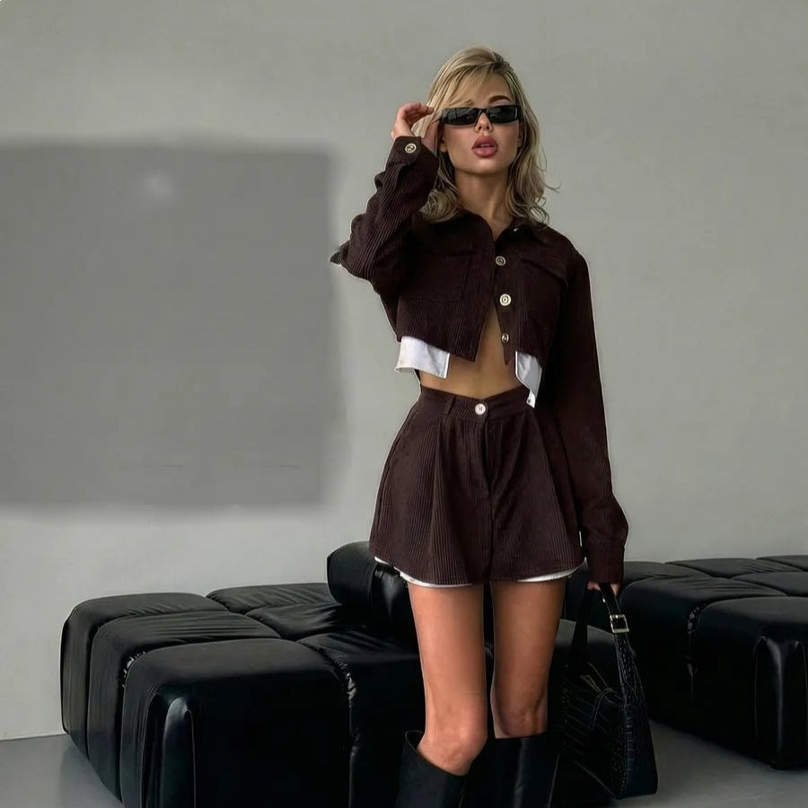 Women's stylish corduroy suit set with short jacket and flared skirt