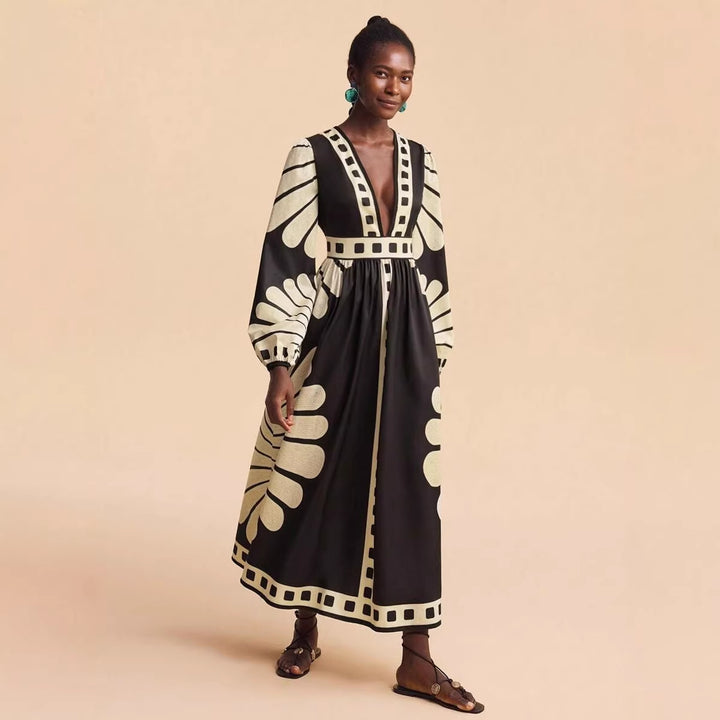 Women's maxi dress with deep V-neck and extravagant sleeve designs Lune London