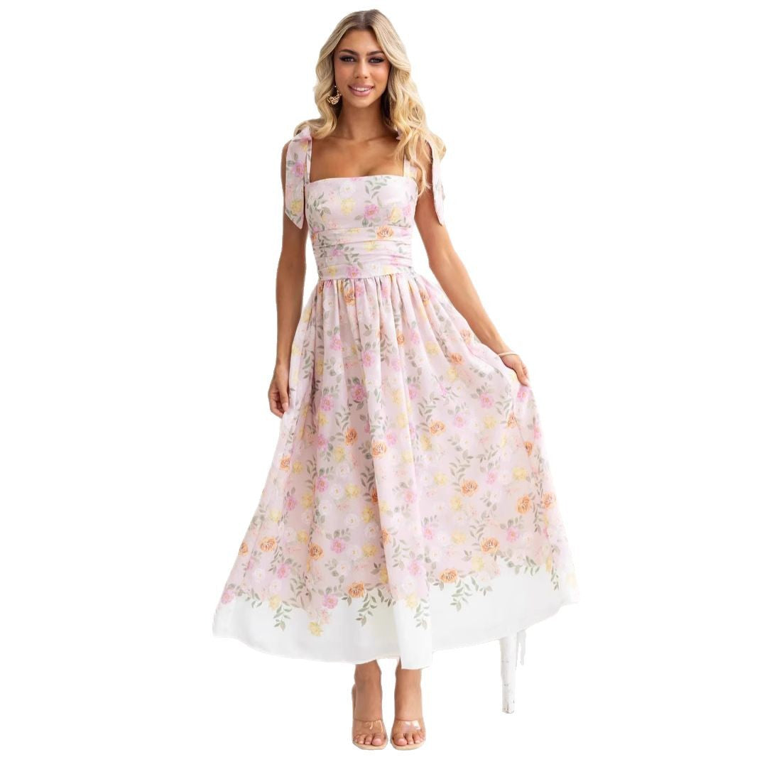 Women's maxi dress with playful straps and floral print