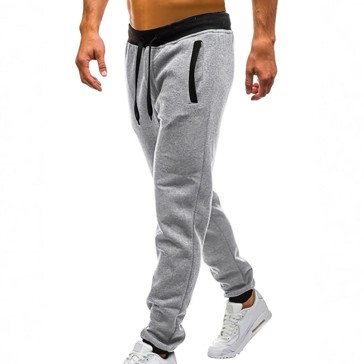 Men's sporty jogging pants with incorporated side pockets and adjustable drawstring Lisslune
