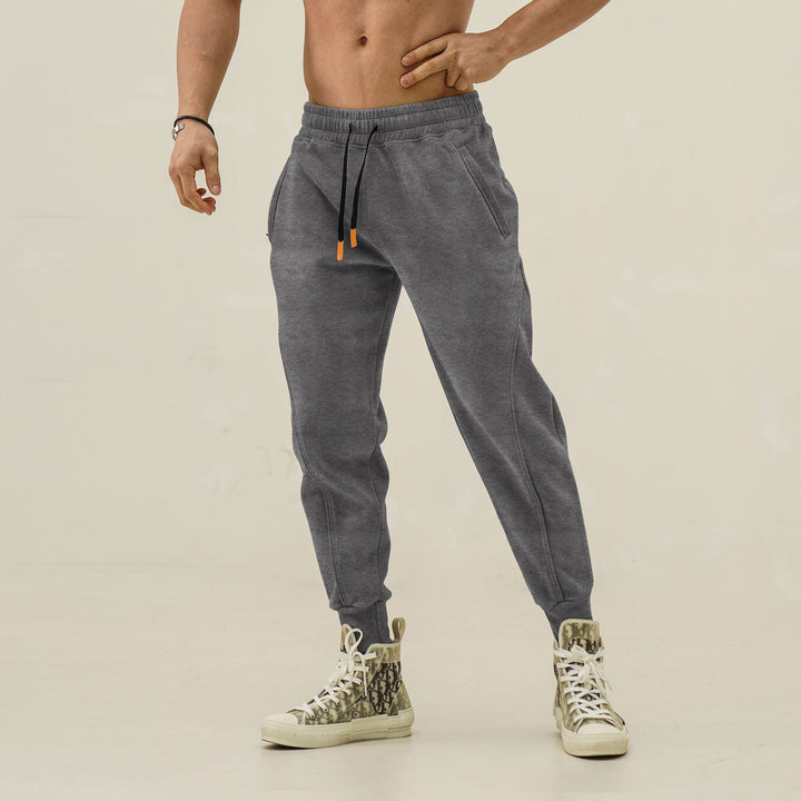 Men's sporty jogging pants with elastic waistband and stylish contrast stripes Lisslune