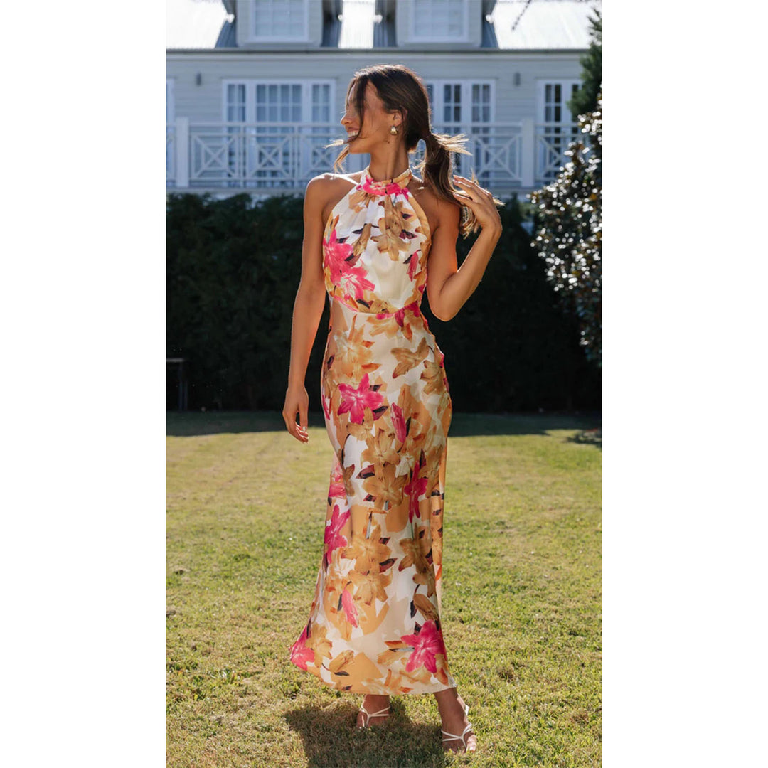 Women's maxi dress with high-neck halter design and floral pattern