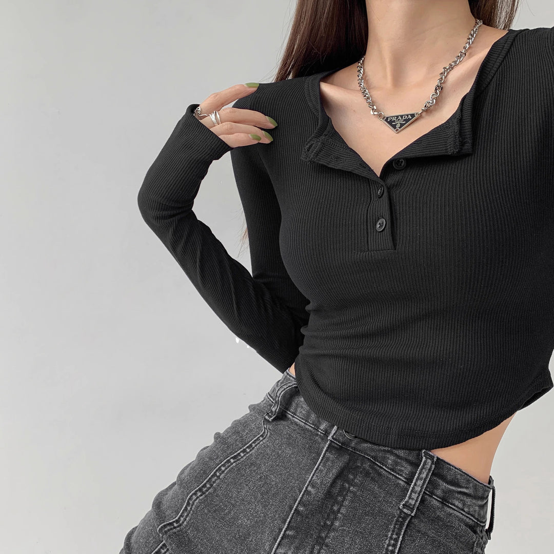 Women's long sleeve shirt with decorative button design and casual fit