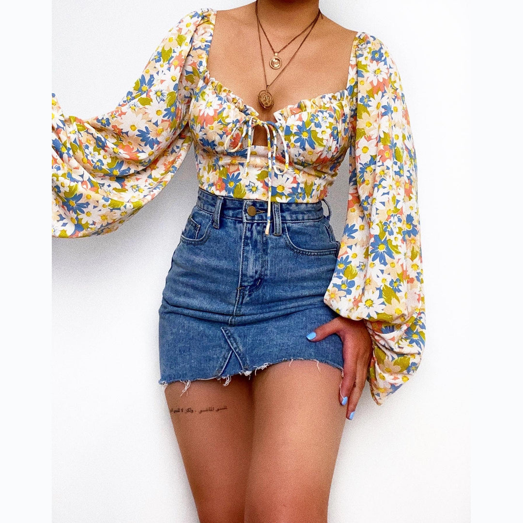 Women's blouse with puff sleeves and floral pattern Lune London