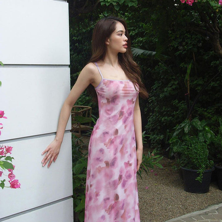Ladies elegant maxi dress with delicate floral patterns and narrow spaghetti straps