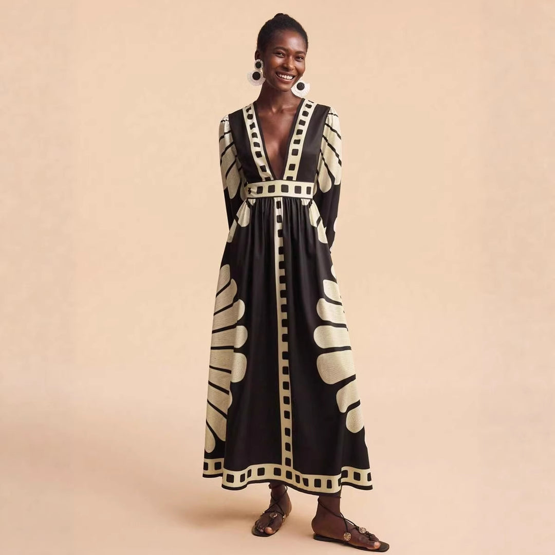 Women's maxi dress with deep V-neck and extravagant sleeve designs Lune London