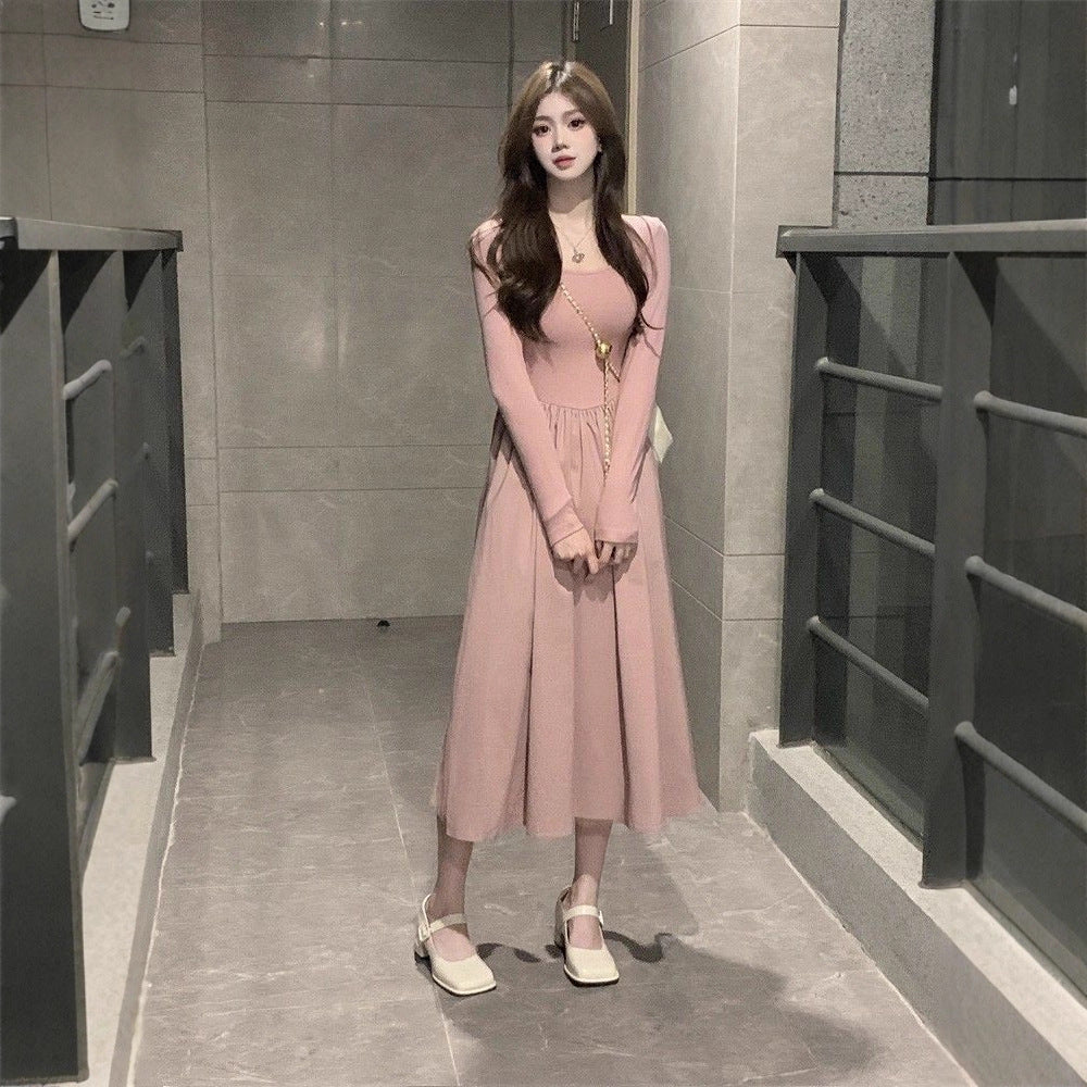 Women long-sleeved midi dress with flared skirt and decorative puff sleeves