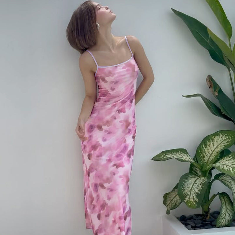 Ladies elegant maxi dress with delicate floral patterns and narrow spaghetti straps