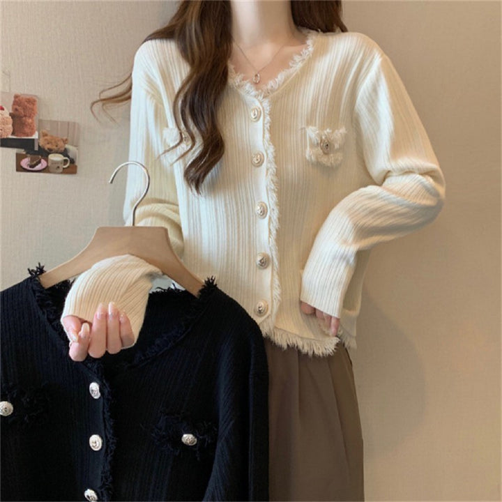 Women comfortable cardigan with subtle fringes and fashionable buttons